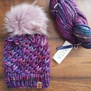 Hand knit merino wool beanie hat with faux fur pom pom
